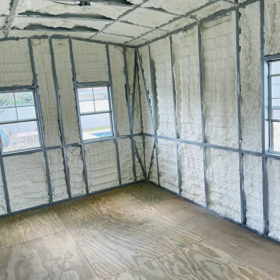 Closed-cell spray foam insulation applied to wall cavities in a residential project in Marietta